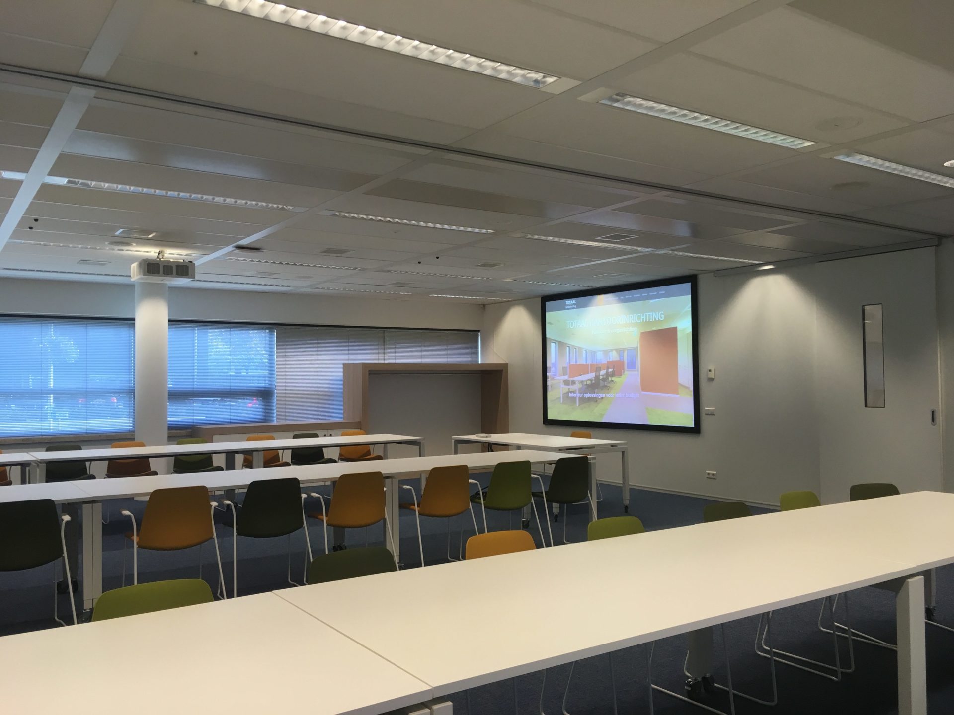 Presenteren én livestreamen in een collegezaal van PGOsupport